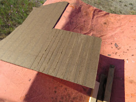 masonite paneling scored on the back