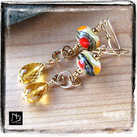 http://www.nathalielesagejewelry.com/products/yellow-earrings