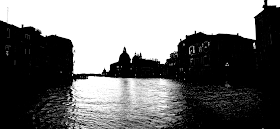 Venice silhouette with domes and churches and the river