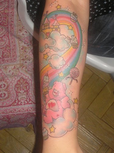 Care Bear with sunglasses tattoo.