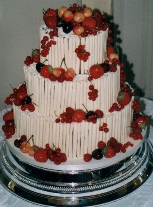 Three tier white chocolate curl cake with a host of yummy summer fruits and