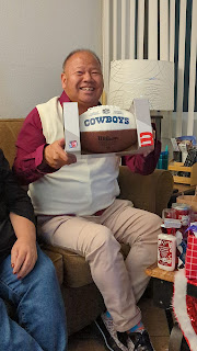 Geoffrey got his Cowboy's football for future autographs from me and Trevor.