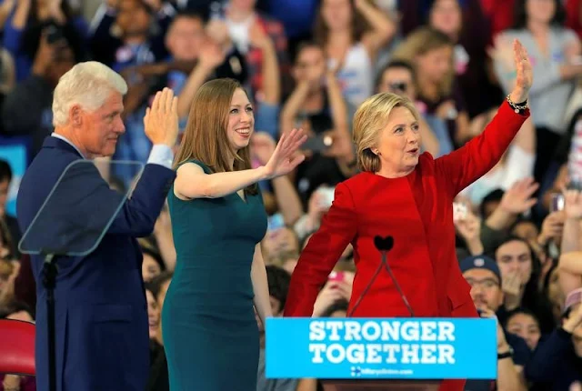  Image Attribute: Democratic presidential nominee Hillary Clinton along with her husband former President Bill Clinton and daughter Chelsea Clinton wave at a campaign rally in Raleigh, North Carolina November 8, 2016. REUTERS/Chris Keane