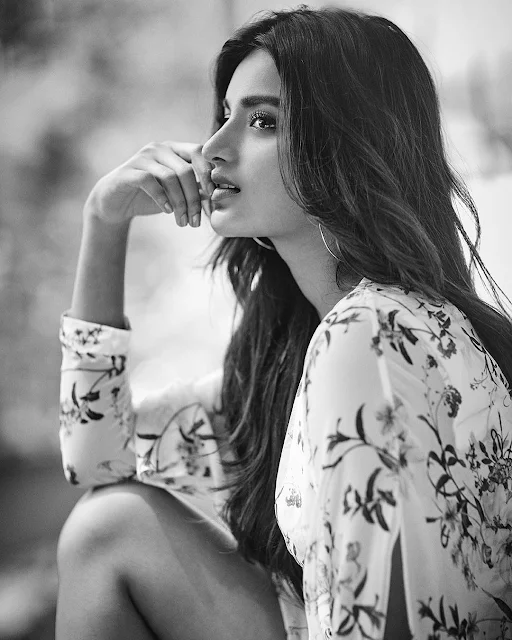 Niddhi Agerwal exudes elegance in her latest photo stills, showcasing Bollywood glamour with grace and charm.