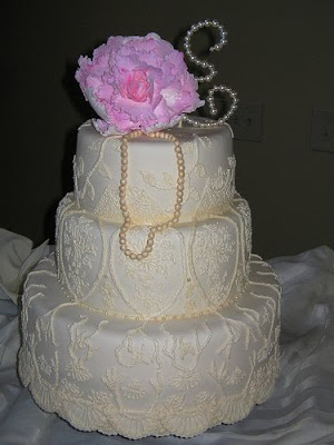 lace wedding cake with roses