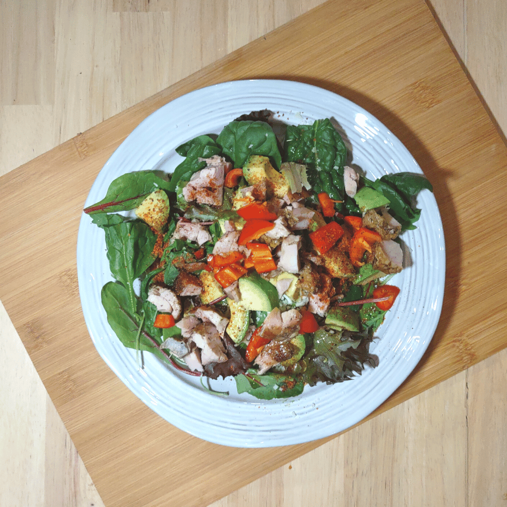A green salad high in protein and heathier dressing.