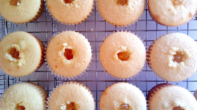 filled cupcakes for Easy Gourmet Pineapple Coconut Cream Cupcakes
