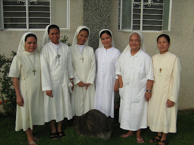 The Somascan Missionary Sisters of Sorsogon in front of their Convent House.