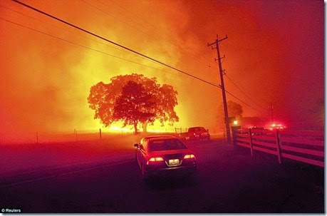 Residents flee as winds whip flames from the Morgan fire along Morgan Territory Road near Clayton, California, September 9 - Copy