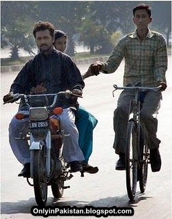 Funny pakistani Motorcyclist