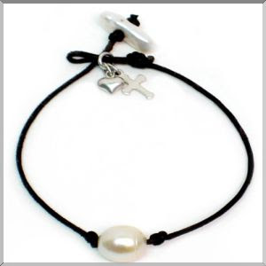 A single freshwater pearl on black leather bracelet