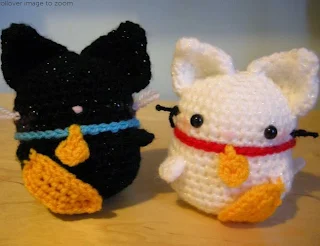 http://www.craftsy.com/pattern/crocheting/toy/amigurumi-maneki-neko-lucky-cat-/43791