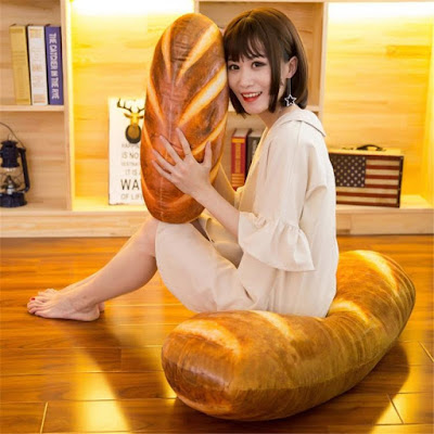 This Unique Pillow Shaped Like A Giant Loaf Of Bread, Perfect For Carbohydrate Lovers