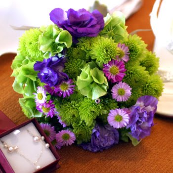 Beautiful and fresh green and purple wedding bouquet