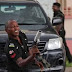 Don't take Pepper o: This Hilarious Trending photos of one of the police officers that fired teargas at Saraki, others in Abuja would break Your Ribs