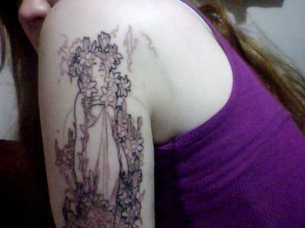 I took this with my webcam right after I got my first Mucha tattoo, 