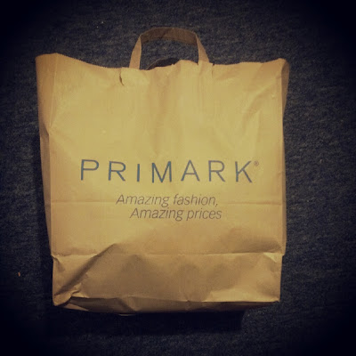 Primark logo brown paper bag