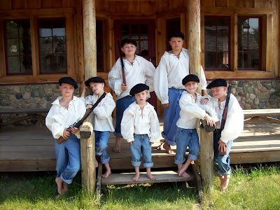 Boys' clothing is almost identical to that of pioneer men. 