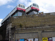 four tube carriages above Great Eastern Street