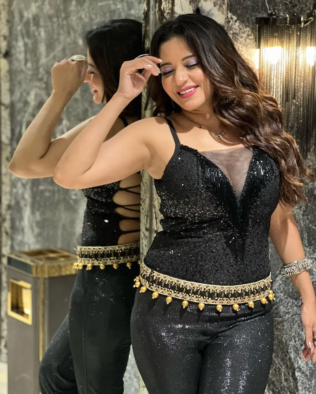 monalisa cleavage black stylish outfit curvy actress