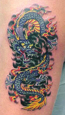 Half sleeve dragon tattoo