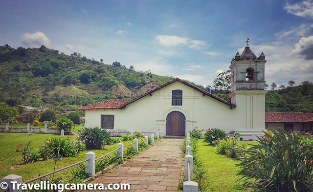 Orosi valley is one of the most beautiful, yet fairly untouched, region of Costa Rica. Barely 30 kilometers from the capital city San Jose, it is a miracle that this valley remains so pristine and the settlements so quaint. Surrounded by volcanos, hills, and lush green forests, the valley is the ideal place to stay for a few days and just walk around, especially if you have time on your hands. The valley is also a popular spot for birders because of the huge variety of birds that live here. With so many habitats merging, you see flycatchers, parrots, tanagers, hummingbirds, three-wattled bellbirds, motmots and what not. Moreover the city of Cartago, which is built in the Orosi valley is steeped in history. A Spanish colonial past gives Orosi valley a rich historical heritage, of which the three churches that we are going to talk about today, stand out. These buildings, each unique in its own way, give the city and valley a unique character. You will see the buildings if you choose to take the Orosi valley tour from the San Jose city. But be careful to research the prices. Because of so many tour operators and websites offering these packages, it is easy to end up choosing something expensive. You will then end up with a feeling of having been taken for a ride - literally as well as figuratively. Anyways, coming back to the first church that we visited - Colonial Church of Orosi - it is a small and most inconspicuous building in the Orosi Valley. At one glance, you will never guess that the building is about 250 years old. In fact it is one of the oldest buildings of Costa Rica and a symbol of the country's Spanish colonial past. The Colonial Church was built in 1767 and was designated a National Monument in the year 1985. This is also the place where the museum of religious arts is currently located. The Church has been restored twice in 1976 and 1980 and the current structure, as it stands, is simple yet pretty and is surrounded by a small lawn with some lovely flowers. When we got here, the church itself was locked, but there were two really friendly dogs around. For some reason, of the four people present they chose to hang out with me. One of them had a heart-shaped black spot on one side. I tried but could not get a picture. Do watch out for these dogs when you visit this church. They are adorable. Anyways, our guide managed to contact someone and that person was able to get the church open for us. It felt quite awesome. The second church we visited was the Basilica of Our Lady of the Angels. This Church is  located in Cartago and is a much more imposing building when compared to the Colonial Church. This Church was built in the year 1639 and was partially destroyed by an earthquake. It was restored in 1939. The current building combines colonial and Byzantine architecture. Not only is this church quite beautiful, it is also home to beautiful Crimson-Fronted Parakeets. These birds are easy to identify because of the measles-like red spots on its face. These parrots are social creatures and like to live around human habitats and forest edges. However, they cannot tolerate being disturbed too much. The last church we saw was just in passing from our car. Though these appear to be ruins of a church, it is actually a case of abandoned construction. The structure is known as Ruinas de Cartago, which I am pretty certain translates to Ruins of Cartago. Even though the building is incomplete and is decaying, it is beatiful in a melancholic way. In fact, I absolutely loved the look of it. Of these three churches, I absolutely loved Ruinas de Cartago. But the other two, too, are beautiful. What is amazing is that all of these buildings have their unique characters and are so different from one another that you should definitely visit all three when you visit Cartago and Orosi Valley. It will be worth it.