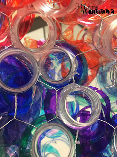 Recycled Chihuly-inspired art using water bottles and markers