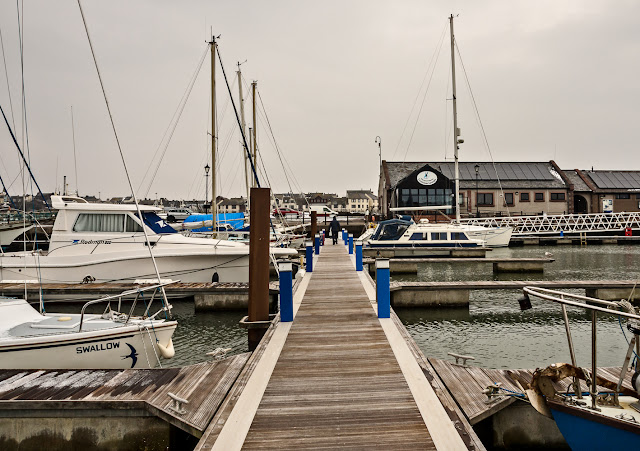 Photo showing our pontoon almost level with the car park at the very high tide