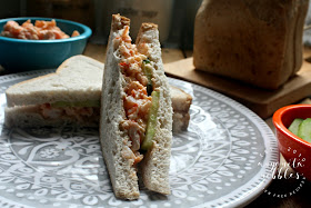 Filling inside a gluten-free prawn mayo sandwich