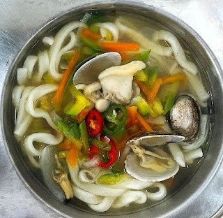 Korean knife-cut noodle soup with Manila clams