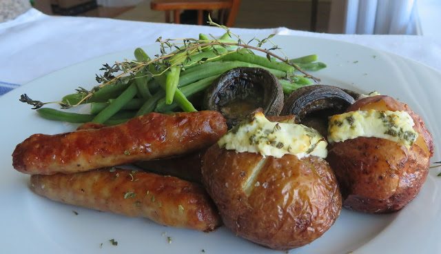 Roasted Sausages with Goat's Cheese Stuffed Baby Potatoes