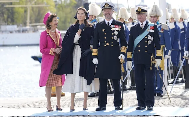 Queen Mary wore a Mark Kenly Domino Tan. Princess Victoria wore a pink dress by Andiata. Princess Sofia wore a coat dress by Andiata