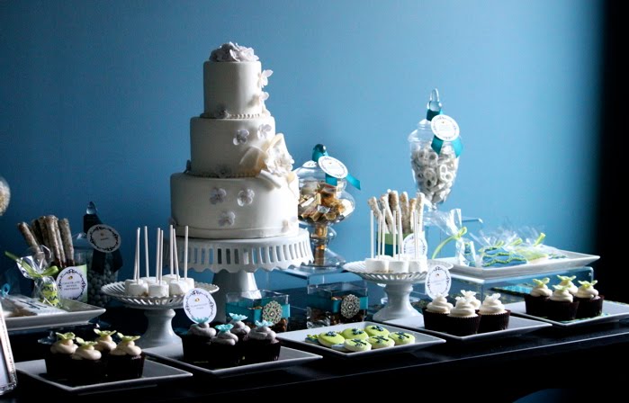 A dessert table including a wedding cake is a great way to make your wedding