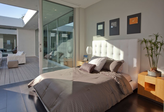 Modern bed in the bedroom 