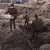 Soldiers unearth the remains of a woman cradling a baby as new footage shows excavation of WW2 mass grave containing the bodies of a thousand Jews massacred by Nazis in Belarus (4 Pics) 