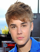 Justin Bieber's hair style made a millions of fans form every part of the . (justin bieber earrings )