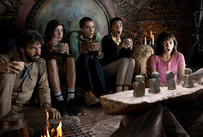 Eugenio Derbez, Nicholas Coombe, Jeff Wahlberg, Madeleine Madden, and  Isabela Moner sit and scream in a movie still for the Dora the Explorer movie "Dora and the Lost City of Gold"