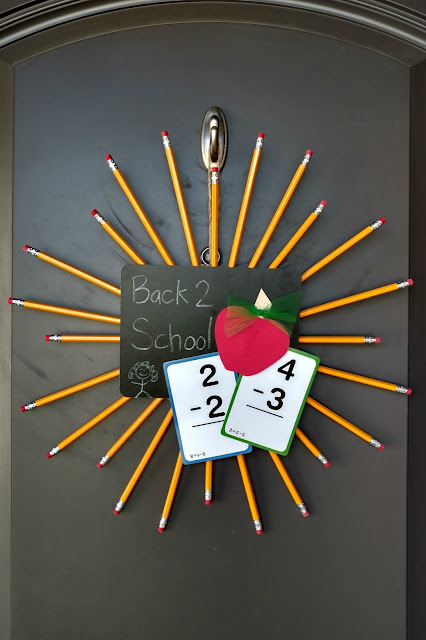 Easy $3 back to school wreath using dollar store supplies!