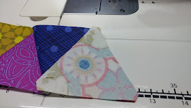 Sewing equilateral triangles