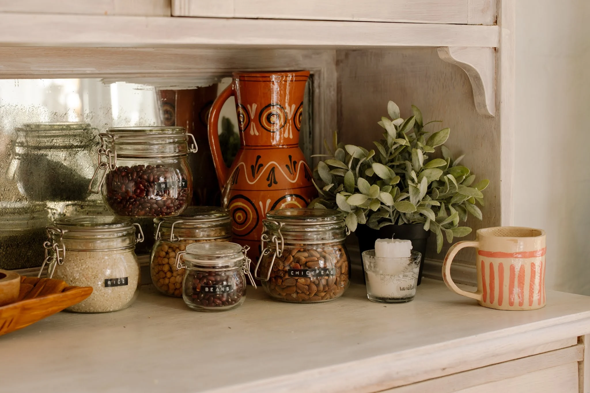 Brown Ceramic Vases on White Table by CottonBro free stock image on Pexel