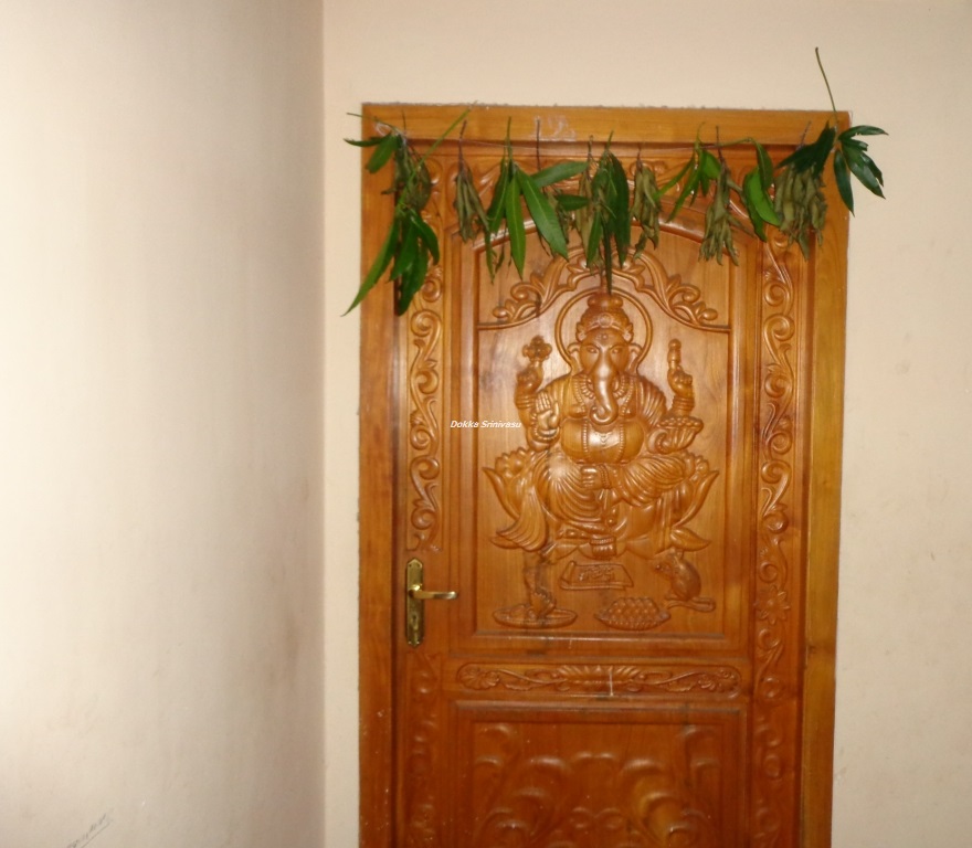Heritage of India Lord Ganesha wooden door  carving photograph