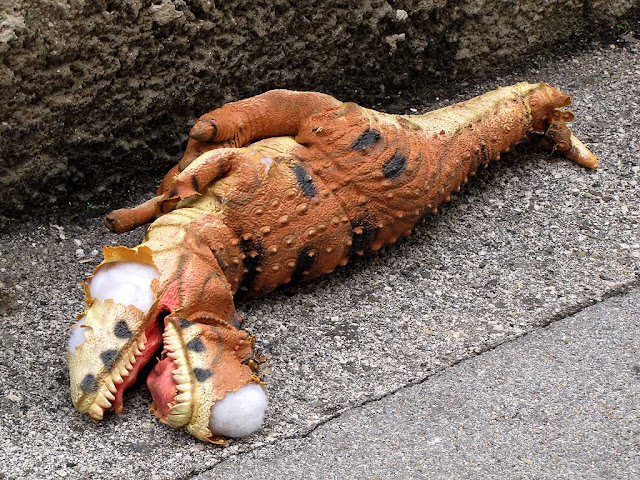 Slayed stuffed T-Rex