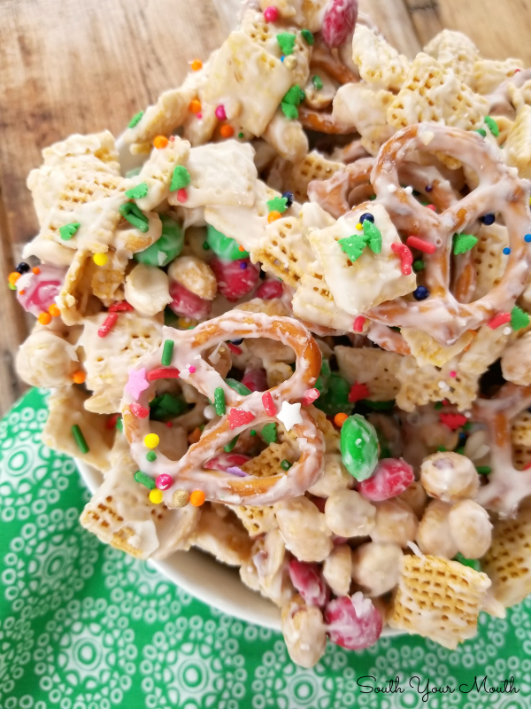 White Chocolate Trash! Also called Christmas Crack, this sweet and salty snack mix made with chex cereal, pretzels, peanuts, M&M’s and white chocolate is the perfect treat!