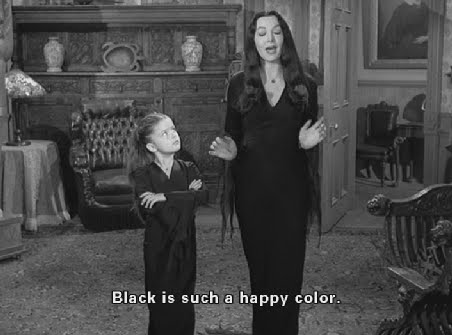 Wednesday and Morticia Addams