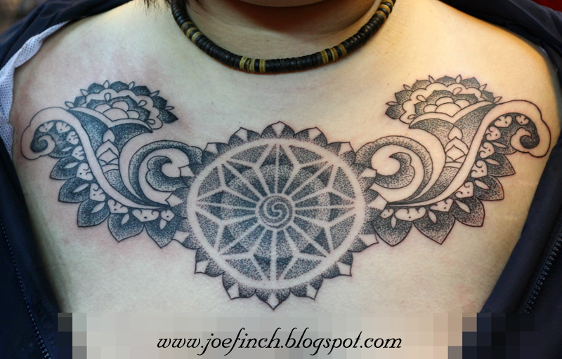 Mandala chest piece tattoo