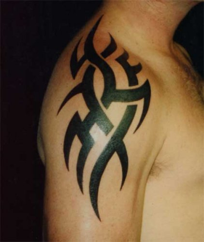 Tribal Tattoo in Arm Great Man with Tribal Tattoo Design 