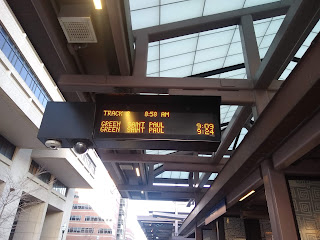 sign says next train in 11 minutes