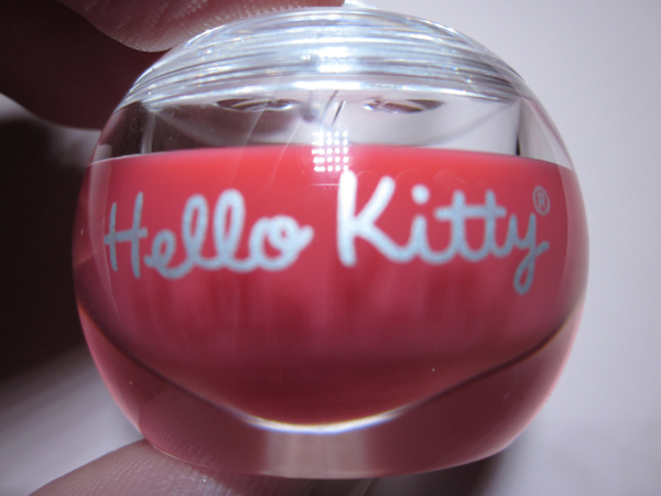 The Hello Kitty logo and font is present on both sides of the packaging with 