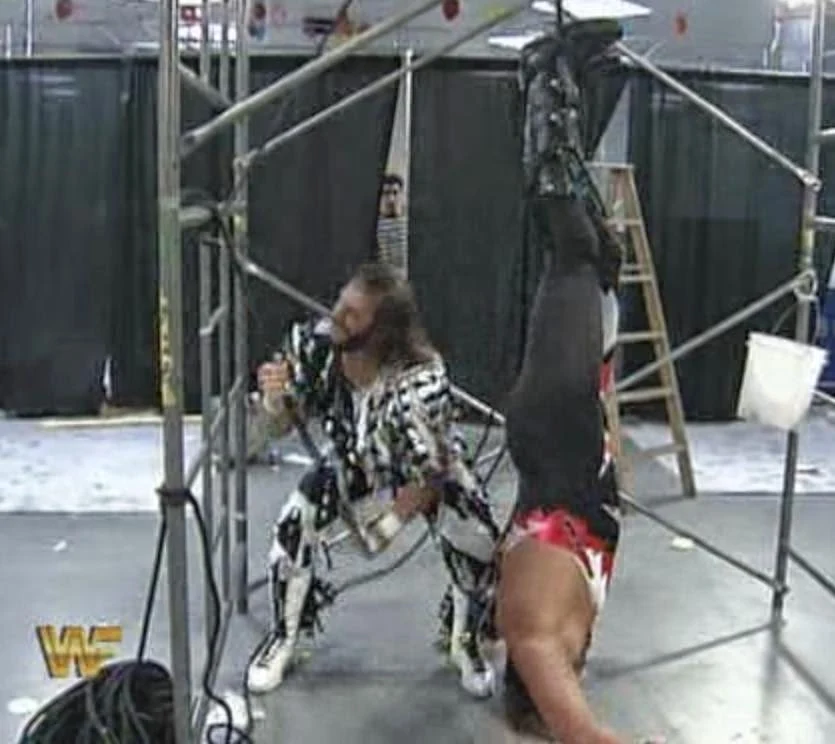 WWF / WWE: Wrestlemania 10 - Randy Savage hangs Crush upside down in their Last Man Standing Match