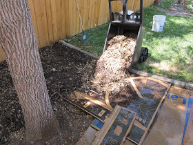 Layer Wood Chips Over Cardboard